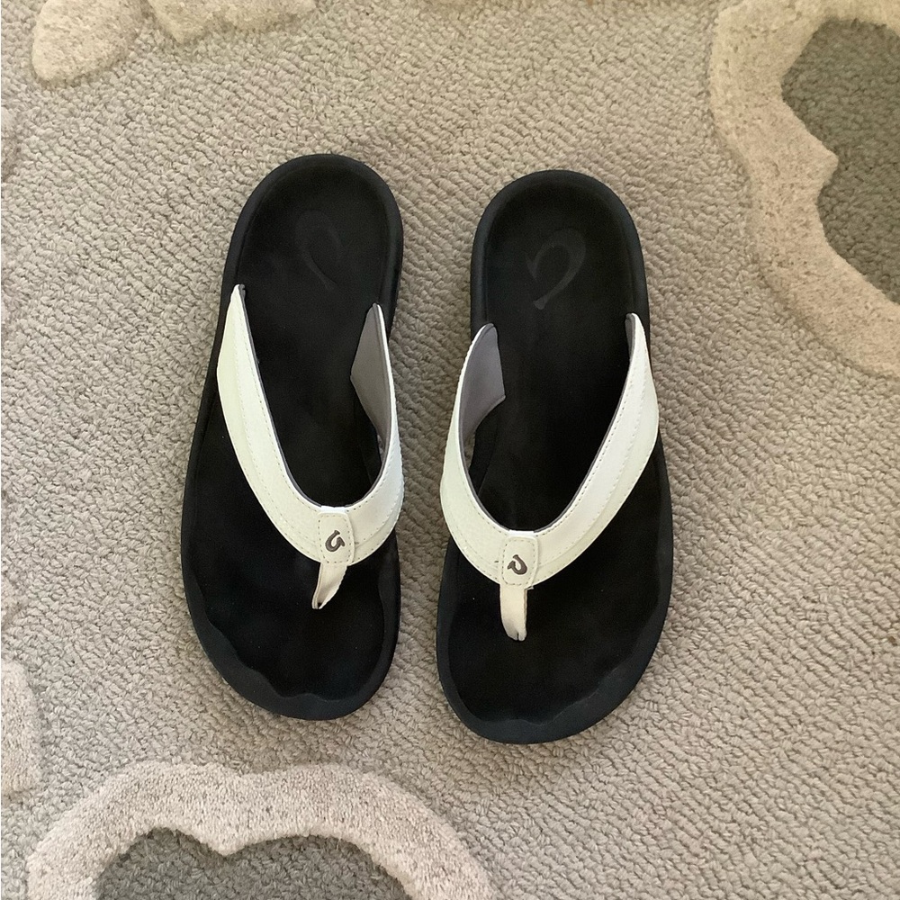White and Black Flip Flops